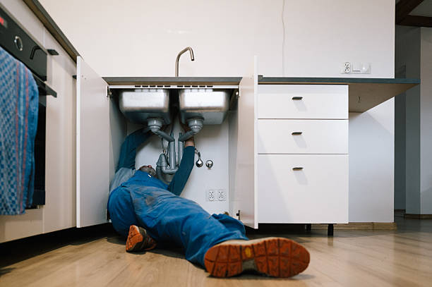 Professional Plumbing technician working in Pepperell, MA